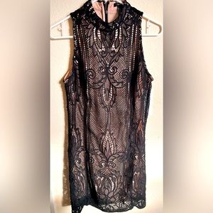 Forever 21: Lace mock Black and Nude  dress in size Small.